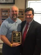 Chiropractor Merrick NY Fred Jones With Award
